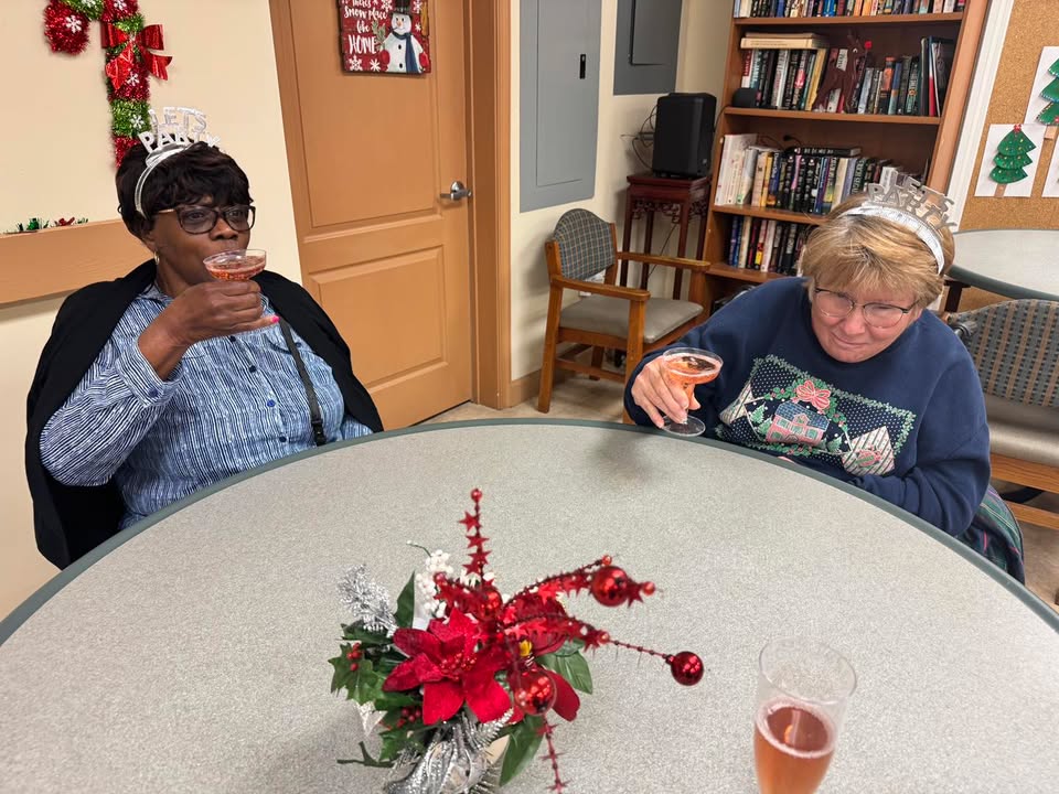 Participants trying virtual reality headsets at SarahCare Adult Day Care